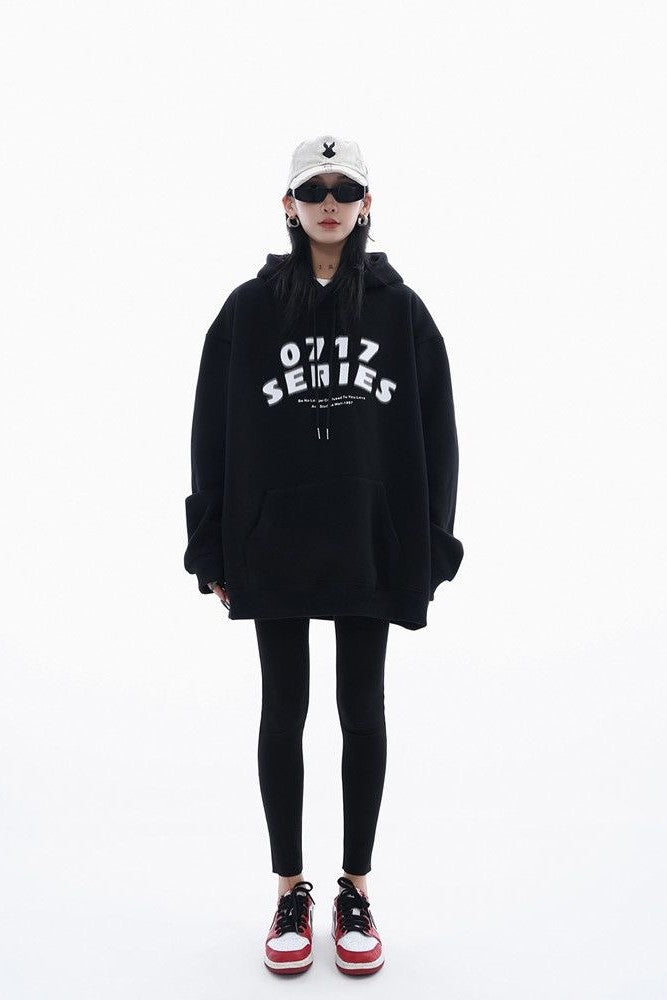 Oversized heavyweight hoodie, showcasing a minimalist graphic design
