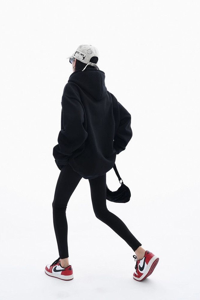 Oversized heavyweight hoodie, showcasing a minimalist graphic design