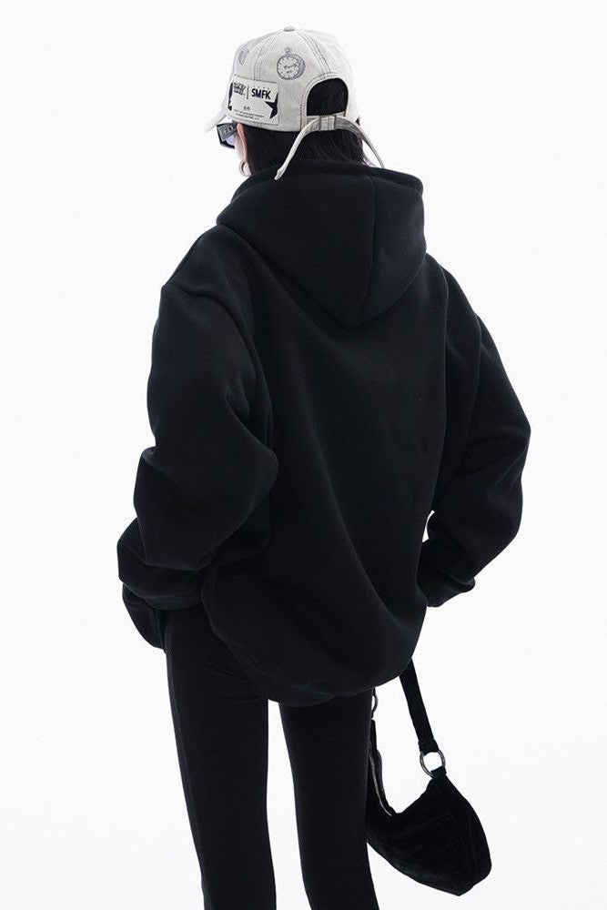 Oversized heavyweight hoodie, showcasing a minimalist graphic design