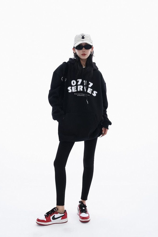 Oversized heavyweight hoodie, showcasing a minimalist graphic design