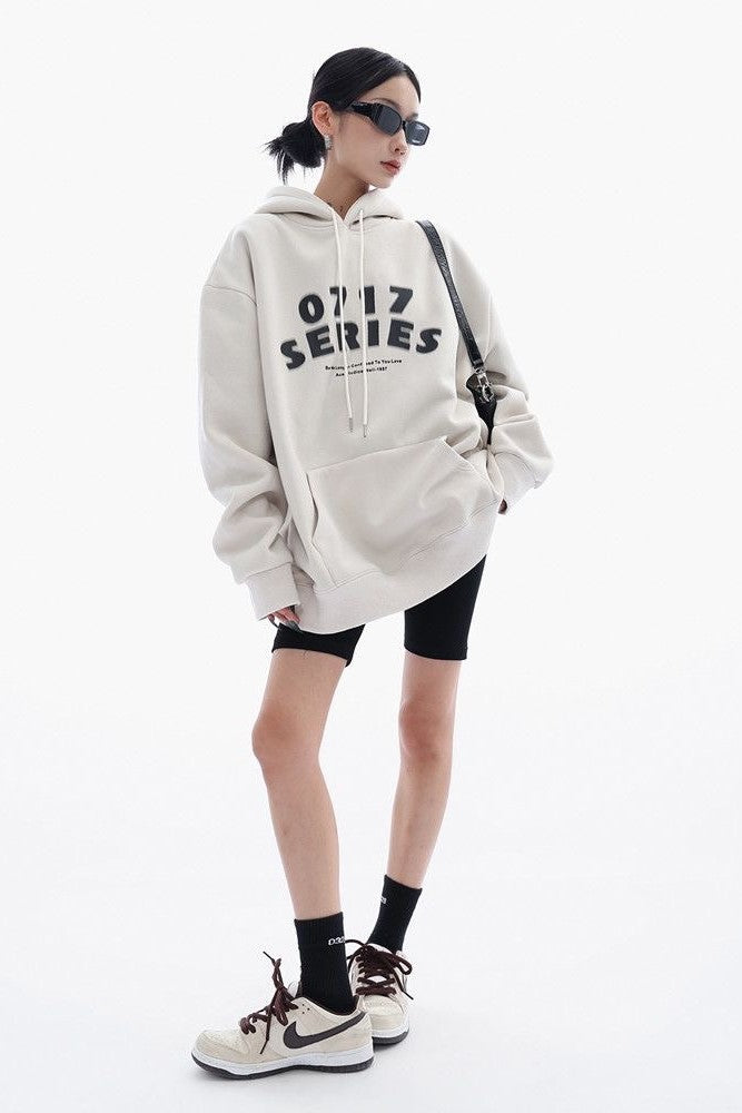 Oversized heavyweight hoodie, showcasing a minimalist graphic design