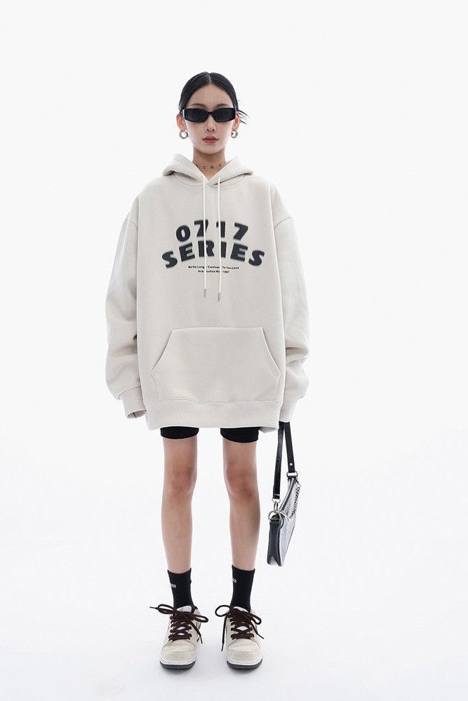 Oversized heavyweight hoodie, showcasing a minimalist graphic design